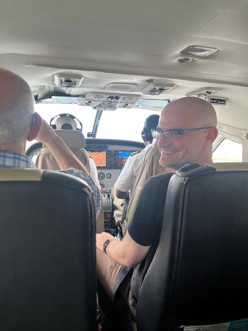 Peter sitting in the commuter plane